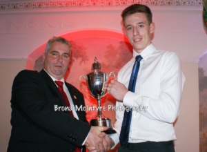 James McNaughton receiving Overall POTY