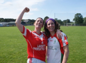 Helena McGarry and Louise McCollum celebrate at the sound of the final whistle